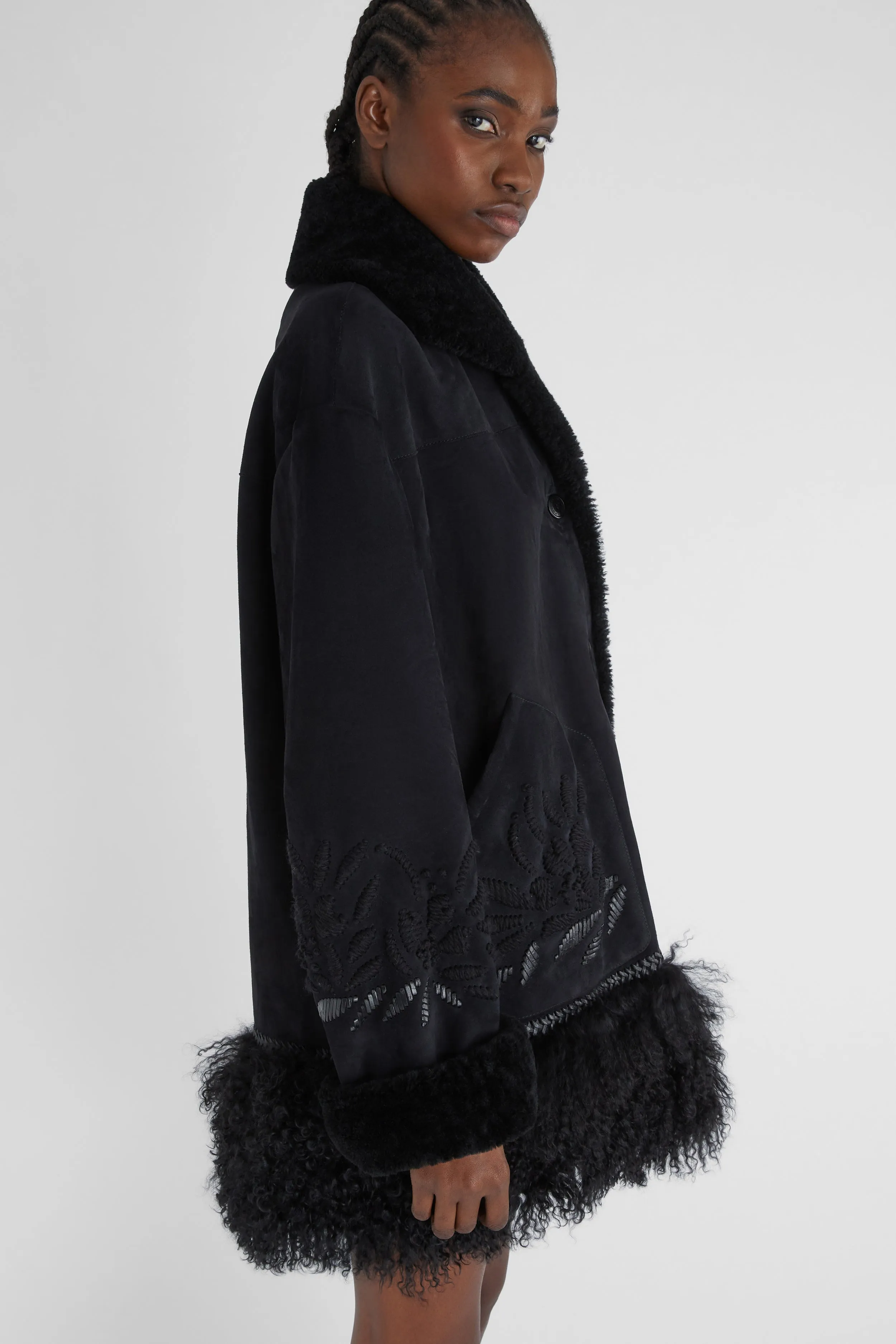 Single-breasted shearling with hand embroidery and fur on the bottom
